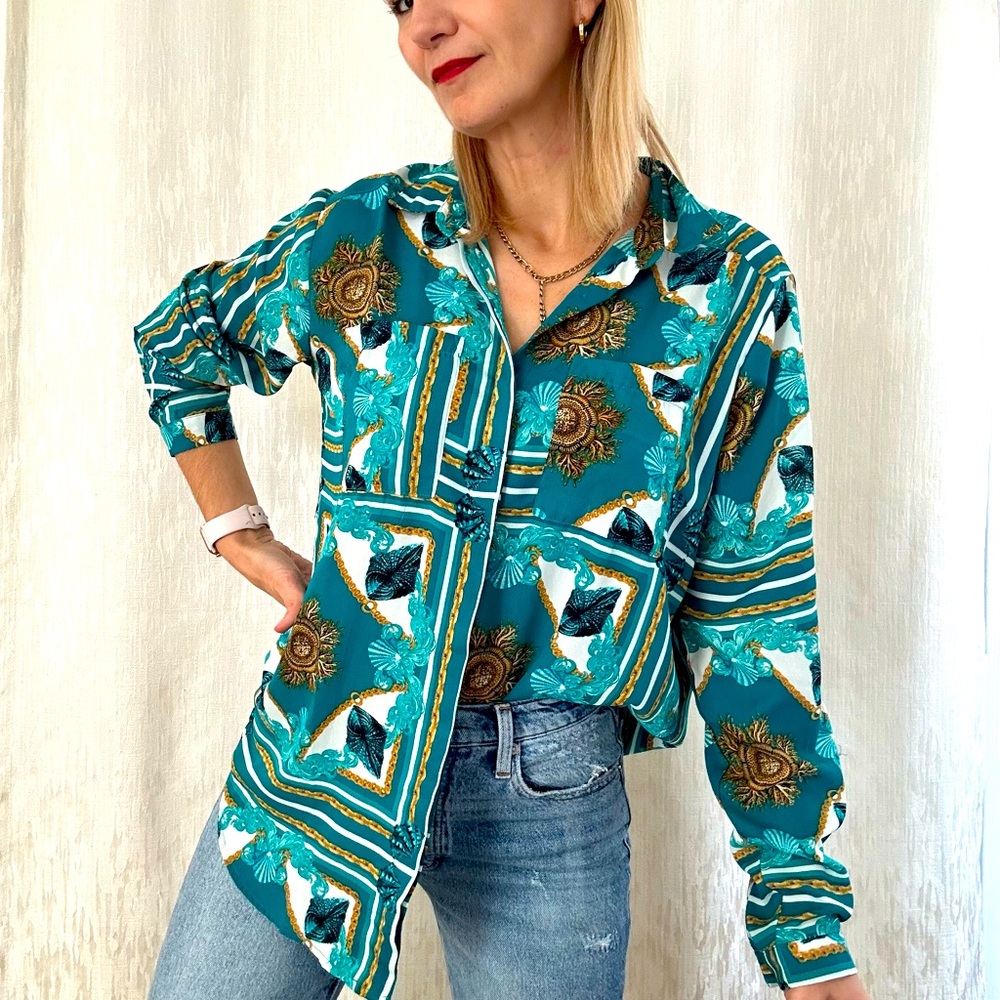 Button down shirt in shades of green with chains and seashells print